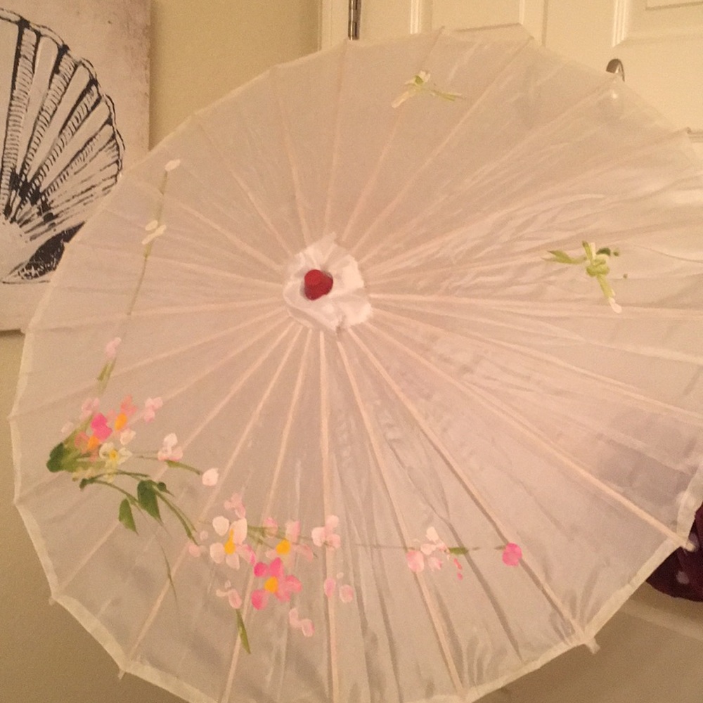 Wooden white umbrella with painted designs